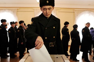 A Russian Navy officer votes in an election that has been statistically proven to be rigged by Austrian statisticians