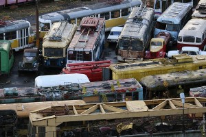Buses, trams, and cars in a scrapyard in Moscow