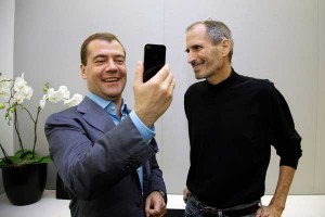 Dmitry Medvedev and Steve Jobs with an iPhone