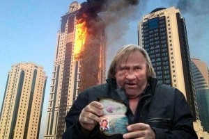 Photoshop of Depardieu standing in front of the burning building, from http://gazetaby.com/cont/art.php?sn_nid=55424